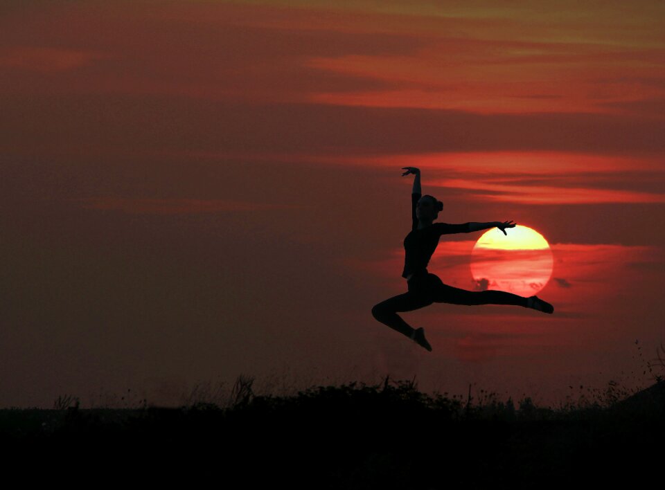 Silhouette in the evening gymnast