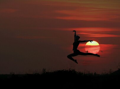 Silhouette in the evening gymnast photo