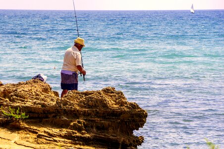 People fishermen beach photo