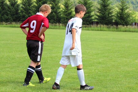 Footballers opponents pupils photo