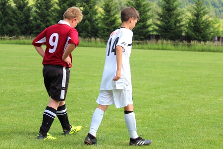 Footballers opponents pupils
