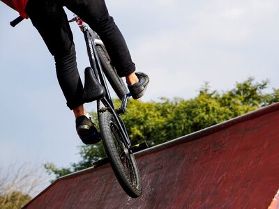 Bicycle wheels jump the squares ramp for bikes photo