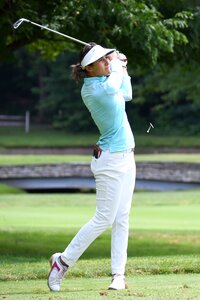 Female tee shot photo