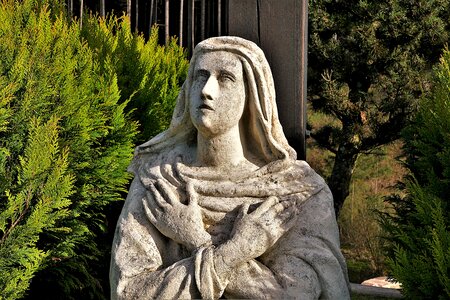 Statue of mary old stone figure photo