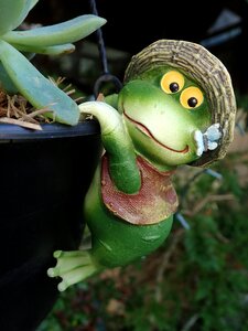 Statue funny pot hanger