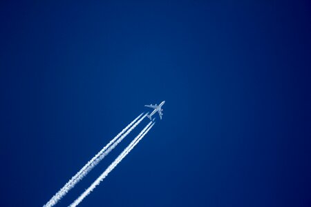 Blue contrail aircraft noise photo