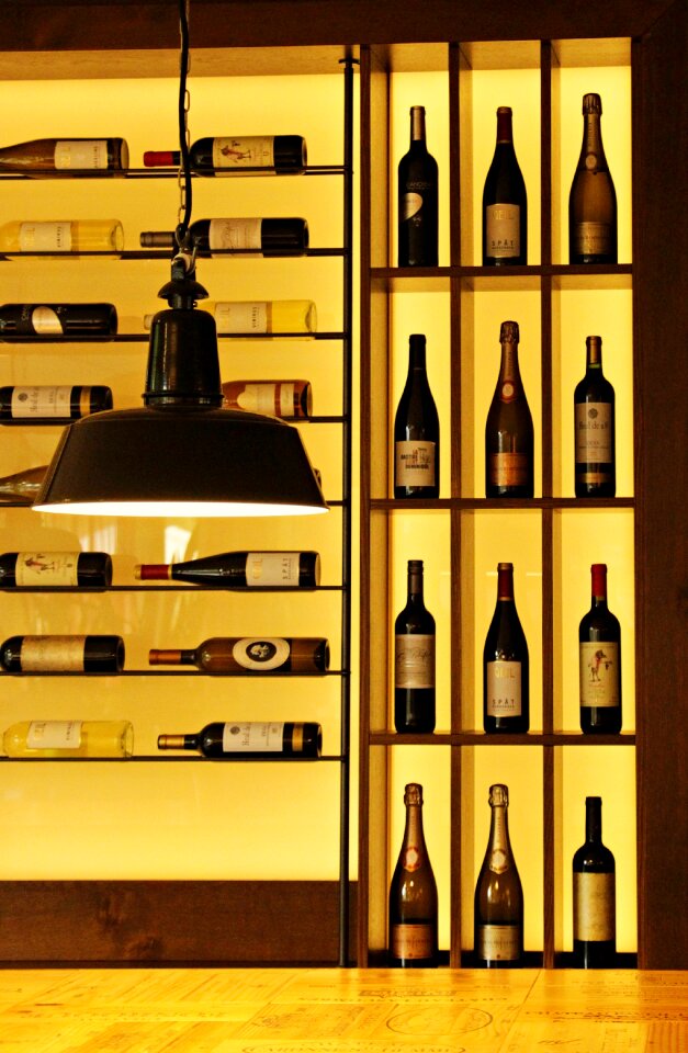 Shelf exhibition bottles photo