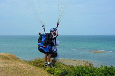 Two harnesses baptism paragliding granville normandy photo