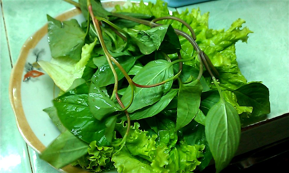 Houttuynia cordata Dokudami served with Banh Xeo in Saigon city.