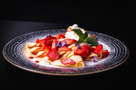 Strawberries whipped cream crepes photo