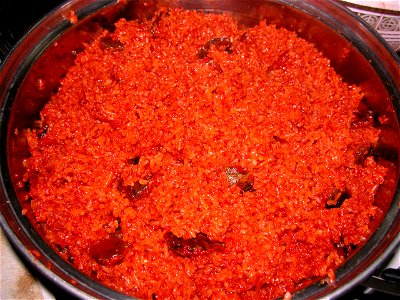 Glutious rice made with extraction from ripe fruits of Momordica cochinchinensis, vietnamese style