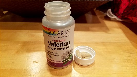 A bottle of capsules of the herb, Valerian (Valeriana officinalis)