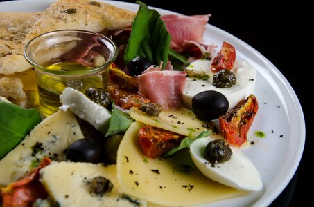 Black olives olive oil dish photo