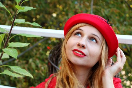 Girl in the hat red hat view photo