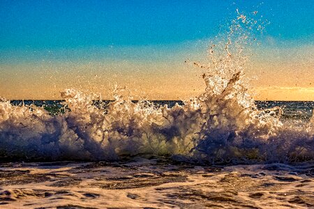 Sea sunset splash photo