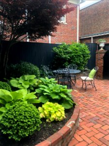 Private courtyard garden provides a quiet respite in historic Old Town. photo