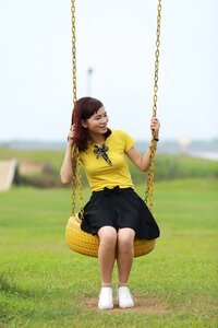 Girl swing fun photo