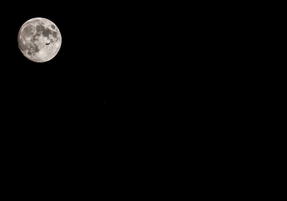 Airplane black black moon