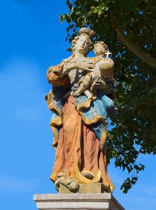 Colorful stone figure female