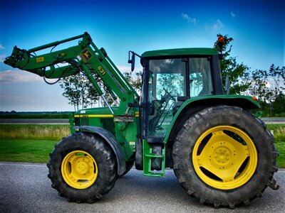 Tractor agriculture working machine photo