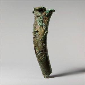 Bronze object in the shape of a horn photo