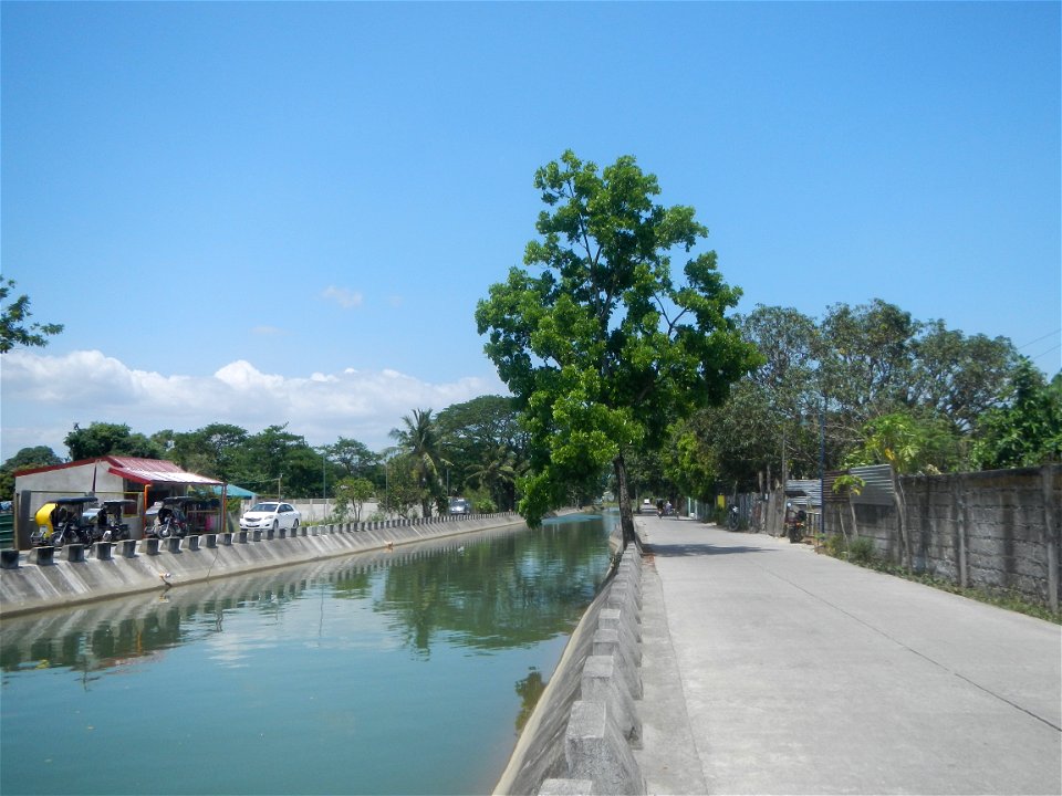 Canal lining NIA REGION 3 BANE IMO  Views of Parulan (irrigation canals along lateral-main NIA roads) 2021 Men with Salbabida (inner tubes) in irrigation canals