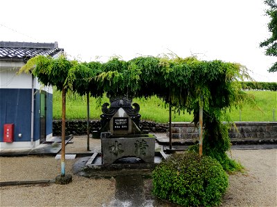 各務原市前渡西町にある松岳山常貞寺。藤棚と手水。 photo