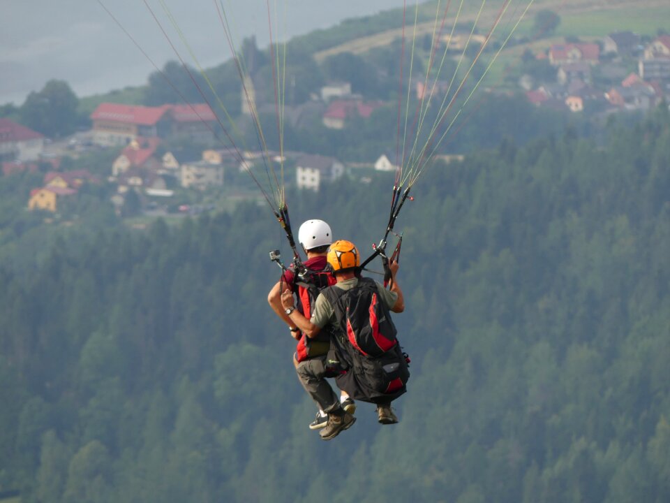 Flying paragliding mountains
