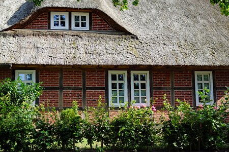 Thatched roof thatched lattice windows photo