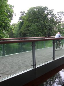 Świebodzka footbridge in Wrocław, Poland.The pavement made from African "red iron wood" (Lophira alata) photo