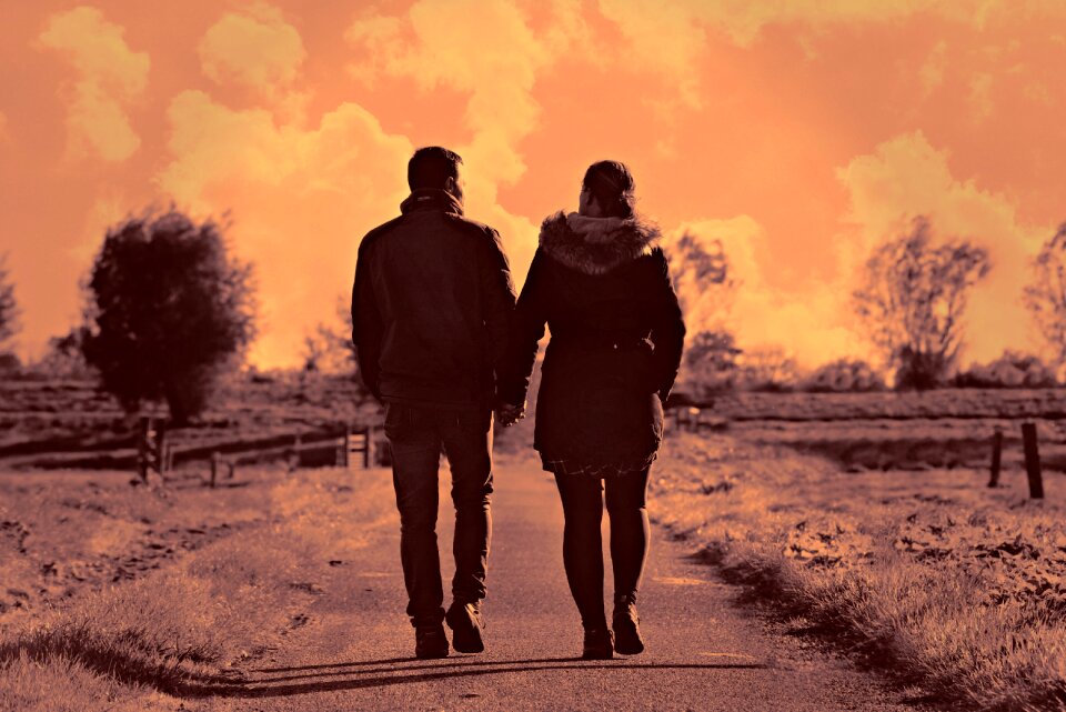 Road walking hand in hand