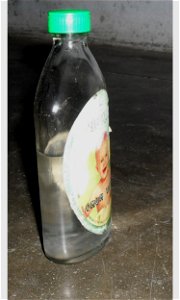 omum water bottle of Tamil Nadu ஒமத்தண்ணீர் உள்ள கண்ணாடிப்புட்டி. இது அனைத்து தமிழக மளிகைக் கடைகளிலும் கிடைக்கும் நாட்டு மருந்து ஆகும். செரிமான மண்டலத் தொந்தரவிற்கு வெறும் வயிற்றில் காலை வேளைகளில் இயற