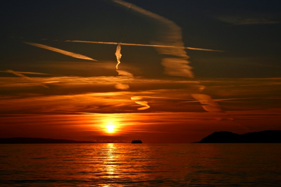 Clouds airplane trails dusk