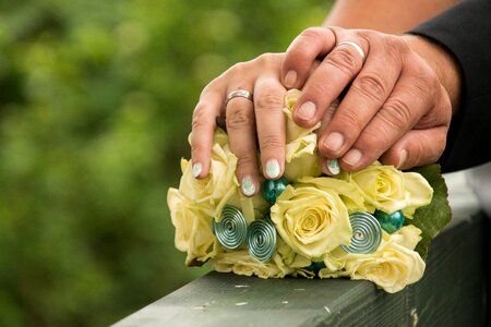 Groom bridal bouquet hands photo
