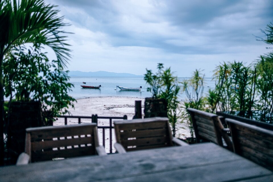 Boats cloudy chairs photo