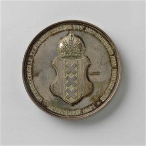 IdentificatieTitel(s): Internationale tentoonstelling tot bevordering der fotografie Amsterdam 1891Objecttype: prijspenning Objectnummer: NG-2014-22-1Omschrijving: Penning van zilver. Voorzijde pennin