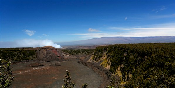 Wide angle view of Kīlauea Iki, Kīlauea, Halema‘uma‘u and Mauna Loa. photo