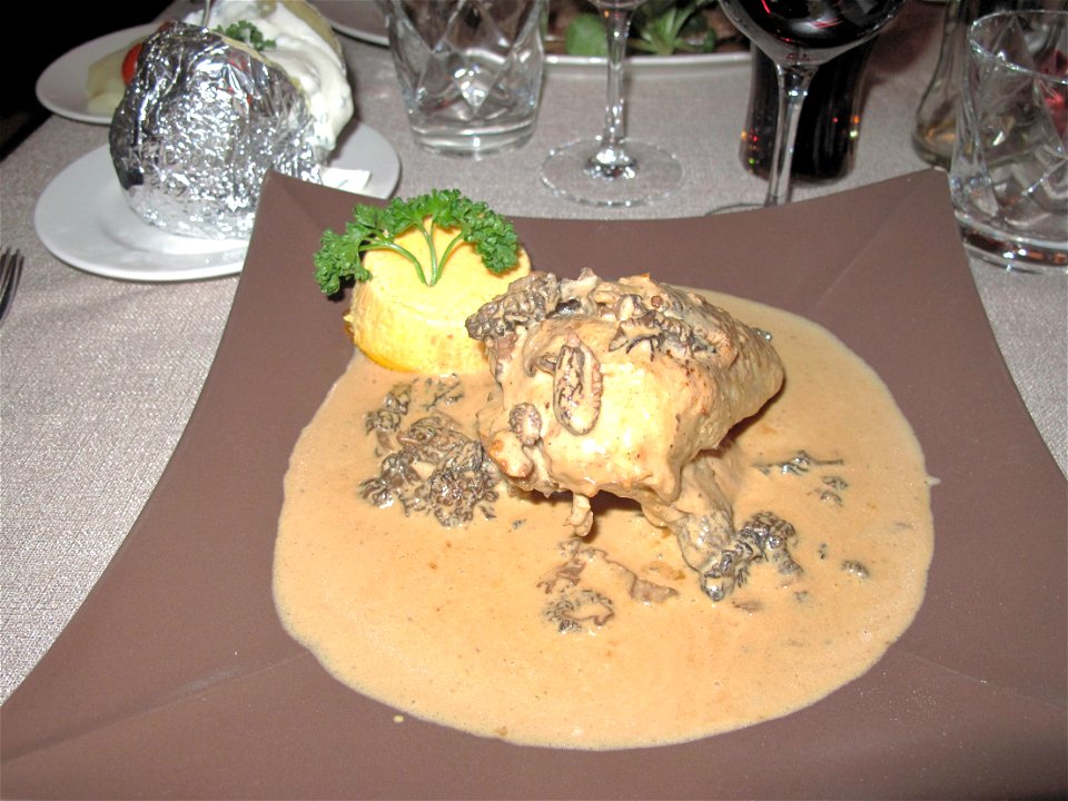 Traditional recipe Poulet aux morilles (=Chicken with morchellas) in the restaurant "la Flambée" of the "Village Motel" in Tournus (Saône-et-Loire, France).