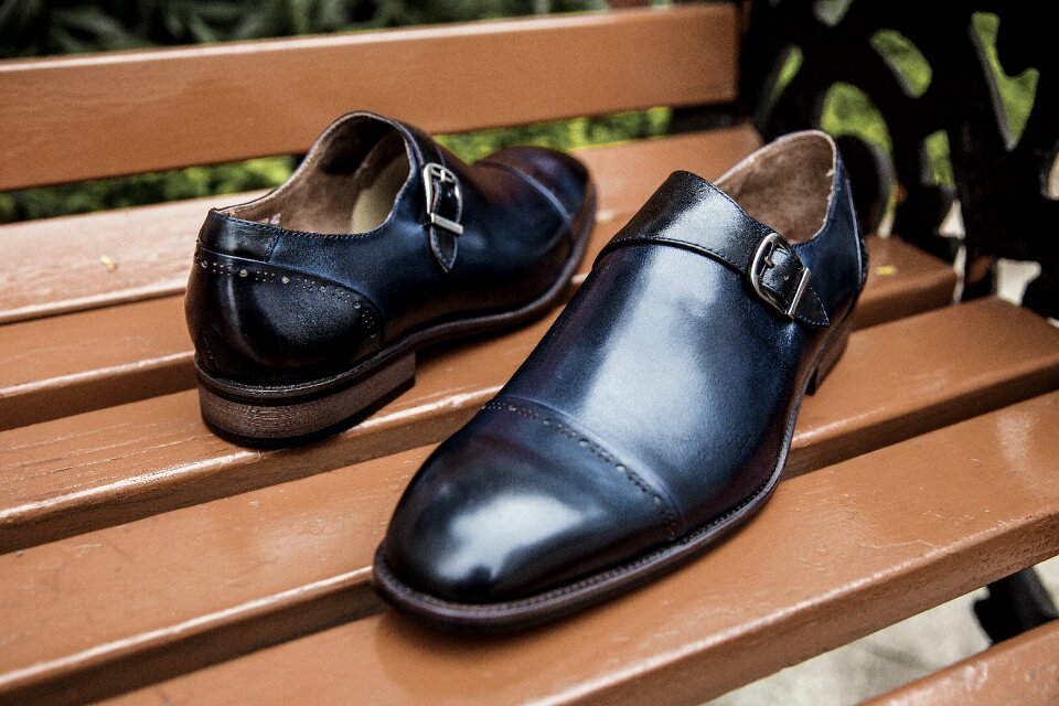 Shoe shine monstrap shoe man