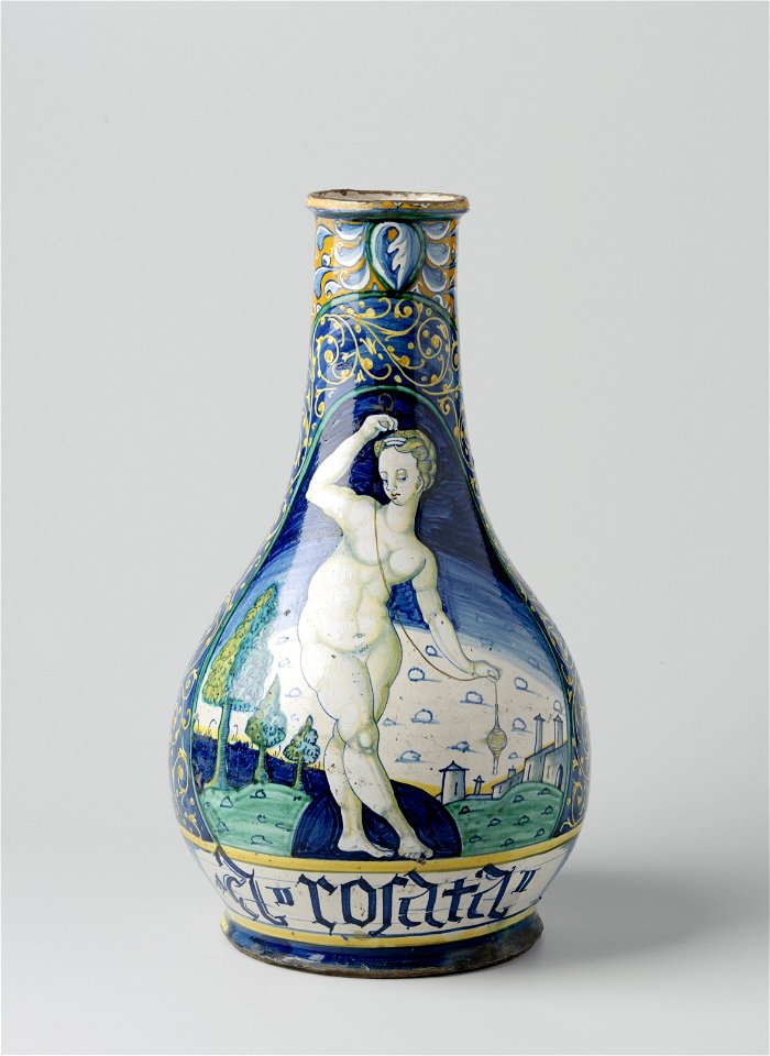 IdentificatieTitel(s): Vaas, flesvormig, veelkleurig beschilderd met landschap met naakte vrouw (Ariadne) en met op banderolle het opschrift: A ROSATAObjecttype: vaas Objectnummer: BK-17304Omschrijvin