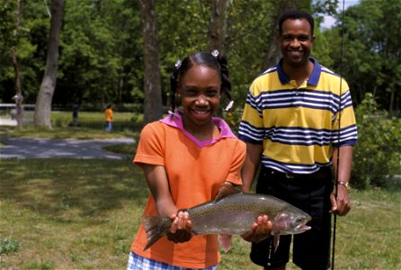 Image title: Father and daughter show rainbow trout that daughter caught at local pond Image from Public domain images website, http://www.public-domain-image.com/full-image/people-public-domain-image photo