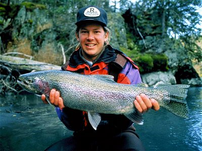 Image title: Man holding a rainbow trout (Oncorhynchus mykiss) Image from Public domain images website, http://www.public-domain-image.com/full-image/sport-public-domain-images-pictures/fishing-and-hu photo