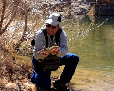 Image title: Fisherman catch of stocked gila trout Image from Public domain images website, http://www.public-domain-image.com/full-image/sport-public-domain-images-pictures/fishing-and-hunting-public photo