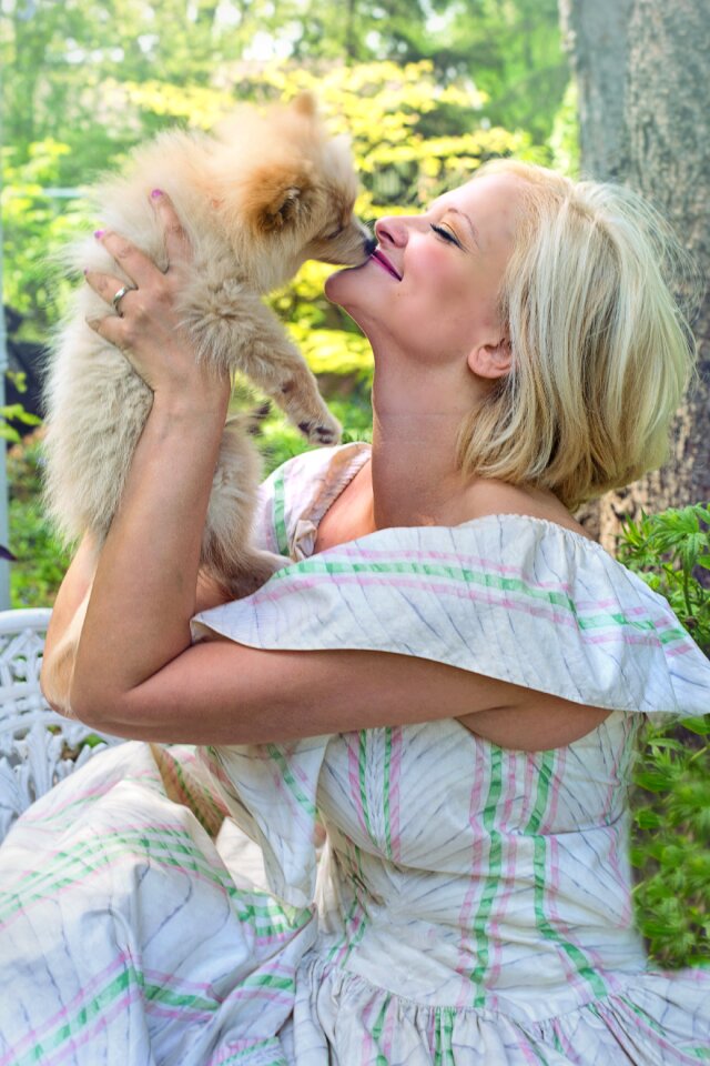 Kissing dog pet