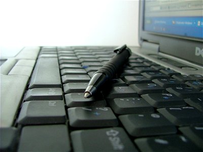 Photo of keyboard and pen