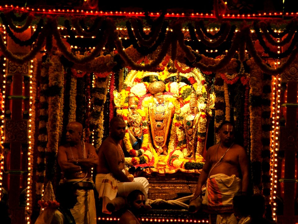 : Lord Rama along with his wife Sita and brother Lakshmana during the annual Teppotsavam festival