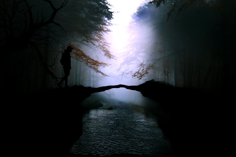 People bridge river