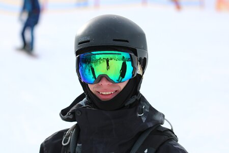 Mountain snowboarders goggles photo