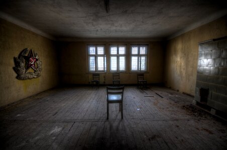 Abandoned window chairs barracks photo