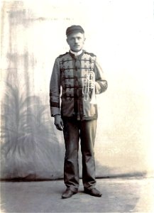 Man in Band Uniform With Cornet photo